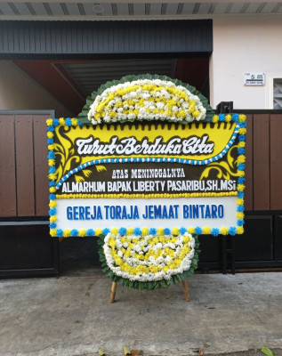 Papan Bunga Duka di Cicadas